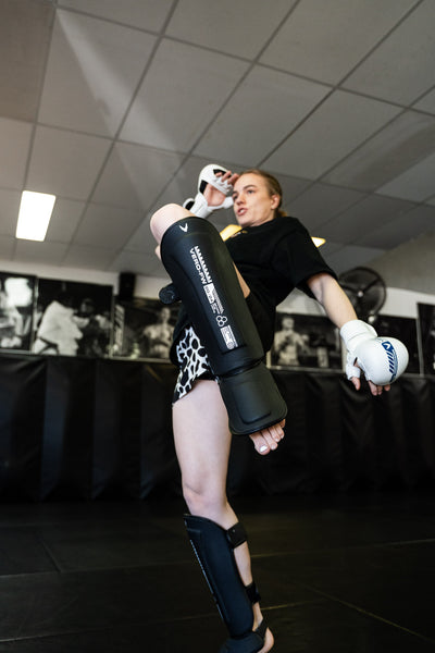 VERO Apex Shin Guards in black — real leather MMA and Muay Thai shin protection — view 2