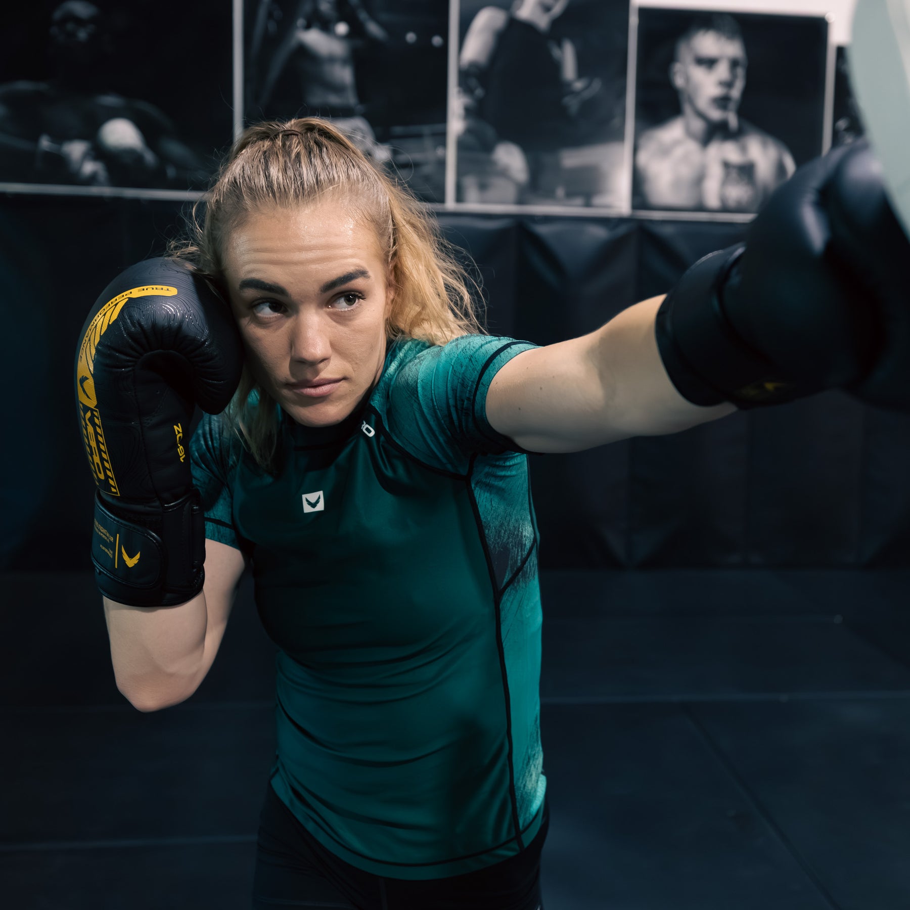 True Grit women's green BJJ rashguard — compression fit for grappling and MMA training