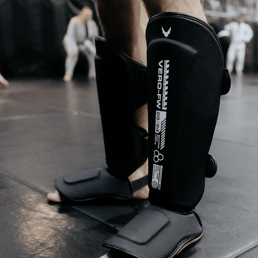 VERO Apex Shin Guards in black — real leather MMA and Muay Thai shin protection